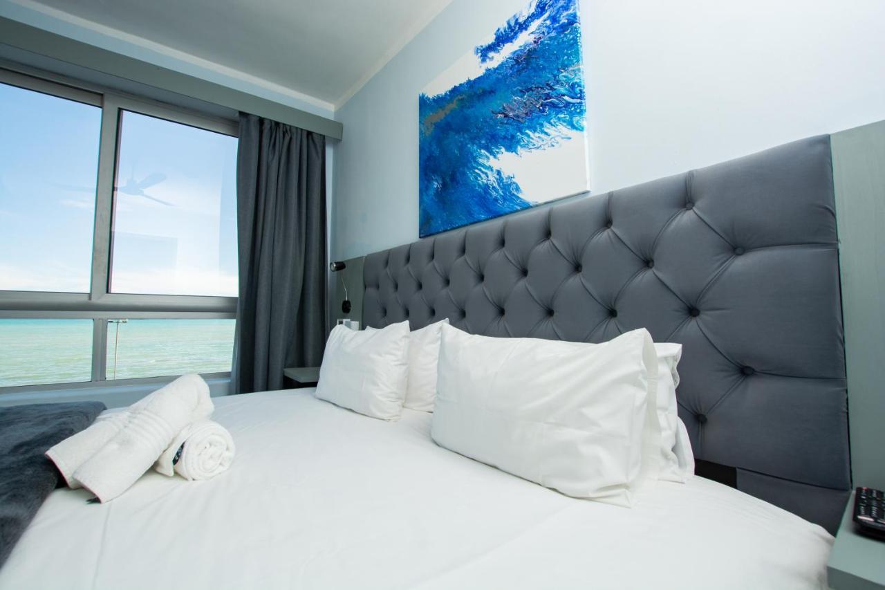 Ocean Breeze Hotel Strand Extérieur photo
