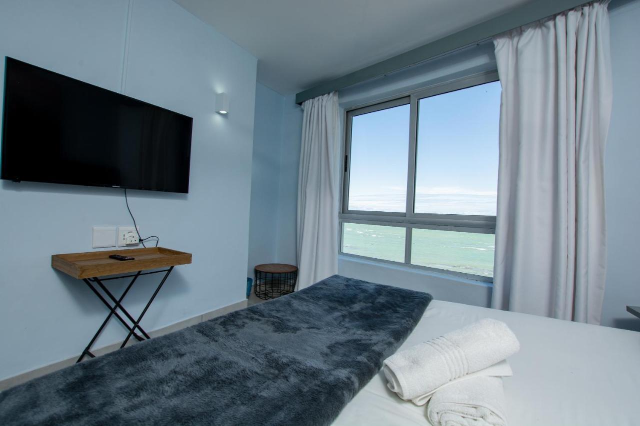 Ocean Breeze Hotel Strand Extérieur photo